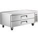 A stainless steel Avantco chef base with two refrigerated drawers on wheels.