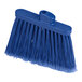 A blue Carlisle Sparta Duo-Sweep angled broom with a handle.