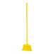 A yellow broom with a yellow handle.