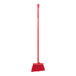 A red broom with long handle.