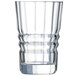 A clear Chef & Sommelier highball glass with a curved design.