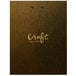 A H. Risch, Inc. Gatsby customizable menu clipboard with gold vinyl metro wrap on a table with a menu.
