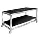 An Eastern Tabletop black and silver metal buffet table on wheels.