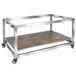 A stainless steel Eastern Tabletop foldaway table frame with wheels.