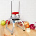 A Vollrath Redco InstaCut tabletop fruit and vegetable dicer on a counter.