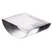 A clear glass bowl on a white surface over a clear glass block with a white background.