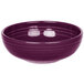 A purple bowl with ripples on a white background.