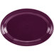 A white china oval platter with a purple rim.
