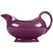 A purple ceramic sauce boat with a handle.