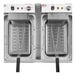 A Cooking Performance Group dual tank electric deep fryer with two baskets.