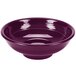 A purple Fiesta pedestal serving bowl with ripples on a white background.