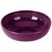 A purple Fiesta china bistro bowl with a rim on a white background.