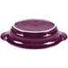A purple oval china baker with a white rim.