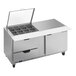 A Beverage-Air stainless steel sandwich prep table with clear lids on two drawers.