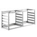 A Regency wall mounted sheet pan rack with four shelves.