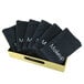 A gold tray holding 12 black Monarch Brands makeup washcloths.
