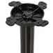 A black cast iron Lancaster Table & Seating standard height table base with a circular top.
