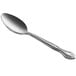 A Choice stainless steel dinner/dessert spoon with a handle.