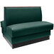An American Tables & Seating green leather booth with a wooden frame.