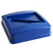 A blue plastic Carlisle recycling bin lid with a paper slot.