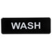 A black sign with white text that says "Wash" and "Thunder Group" in white.