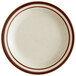 A white Libbey narrow rim stoneware plate with brown speckles and brown bands.