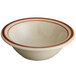 A white bowl with a brown speckled rim and brown bands.