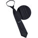 A Henry Segal black neck tie with a zipper on it.