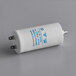 A white cylindrical AvaMix motor capacitor with blue text.