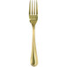 A Walco Colgate gold stainless steel European table fork with a handle.