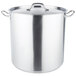 A large stainless steel Vollrath stock pot with handles and a lid.