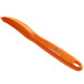 A Victorinox orange vegetable peeler with a white handle.