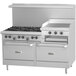 A large stainless steel U.S. Range commercial gas range with black knobs and an open oven door.