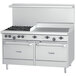 A large stainless steel U.S. Range with 2 burners, a 36" manual griddle, and 2 ovens.