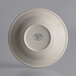 A Libbey cream white stoneware bowl with a rolled edge.