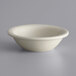 A Libbey Kingsmen white stoneware fruit bowl on a white surface.