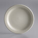 A Libbey cream white stoneware plate with a narrow rim.