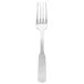 A stainless steel Libbey Colony dinner fork with a silver handle.