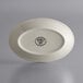 A white Libbey oval stoneware platter with a black logo.