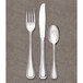 A Libbey stainless steel dinner fork.