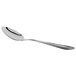 A Libbey stainless steel dessert spoon with a silver handle and spoon.