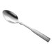 A Libbey Salem stainless steel dessert spoon with a silver handle.