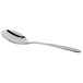 A Libbey stainless steel bouillon spoon with a white handle.