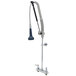 A T&S DuraPull pre-rinse faucet with a metal hose and wall bracket.