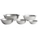 A set of five silver stainless steel Vollrath mixing bowls.