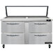 A stainless steel Continental Refrigerator with hinged glass lids over drawers.