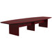 A Safco Corsica cherry rectangular conference table with two legs.