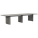 A Safco Medina rectangular conference table with steel gray legs.