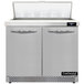 A Continental Refrigerator stainless steel refrigerated prep table with two open doors.