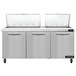 A Continental Refrigerator Mighty Top refrigerated sandwich prep table with two doors open.